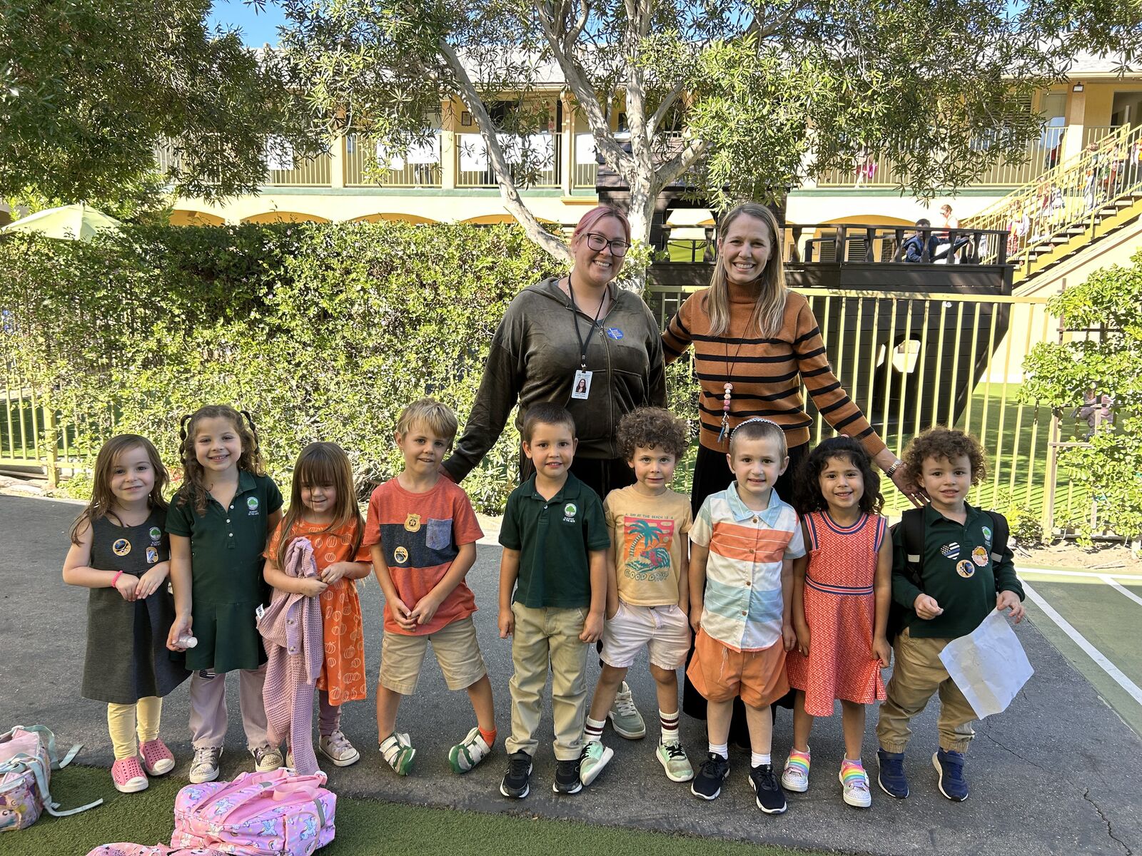 Lower school students with teachers on campus
